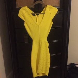Yellow Bebe bandage dress. NWT xs